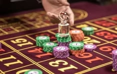 365 online games casino presented on mobile device in Pakistan with slots and live games